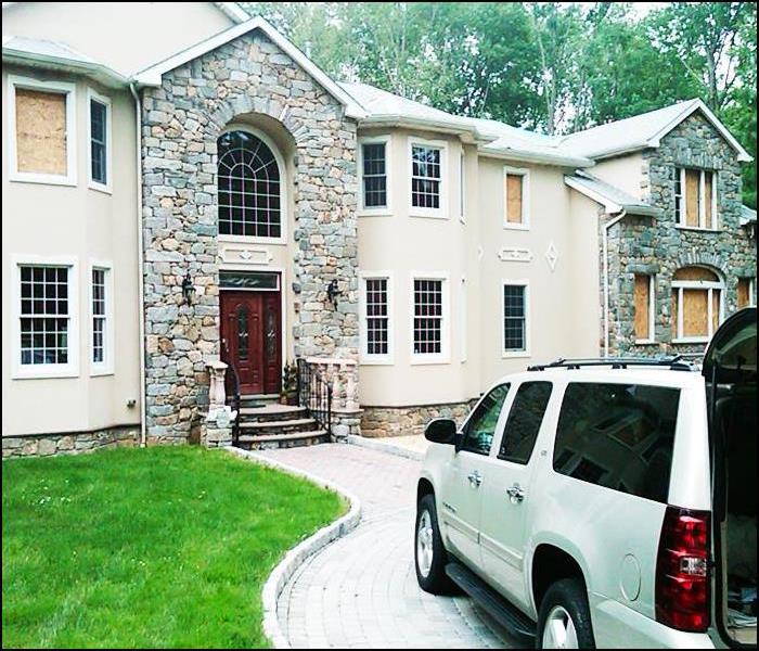 cream and stone two story home